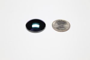 Chalcogenide Lens compared to a coin